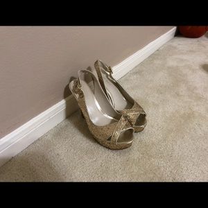 Nine West gold high heels.